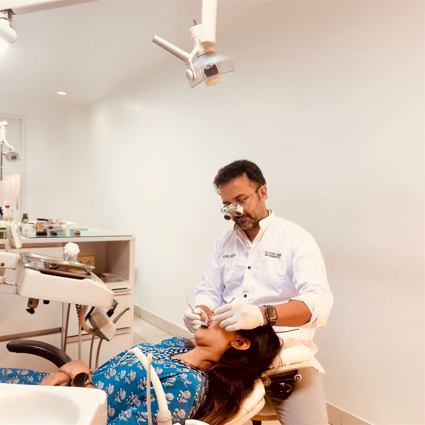 Dr Vivek Amin, MDS Orthodontist, treating a patient at Studio Dental